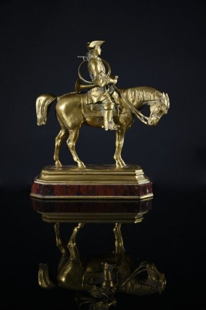 Antoine-Louis BARYE (1795-1875). D'après Piqueur en habit Louis XV.
Bronze doré....