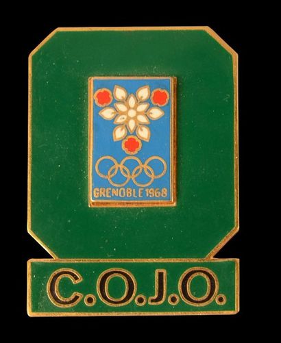 null 1968. Grenoble. Badge C.O.J.O des Xème Jeux Olympiques d'hiver. Emaillé sur...