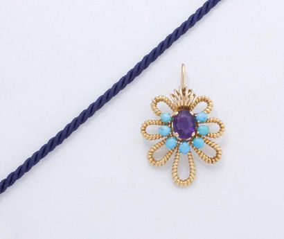 null Pendentif en or 750 millièmes, à décor torsadé et de fils, stylisant une fleur...