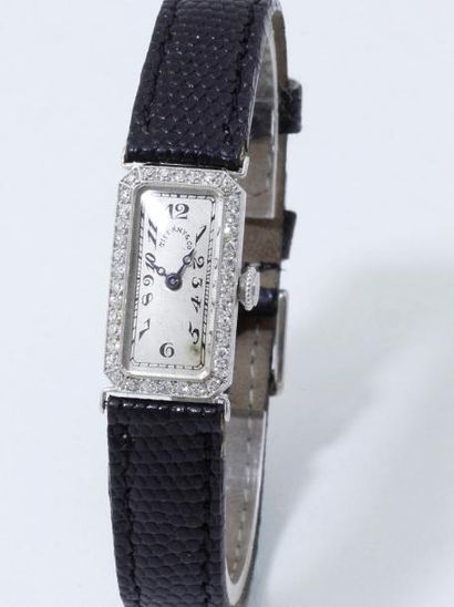null Montre bracelet de dame en platine 850 millièmes, cadran argenté signé Tiffany...