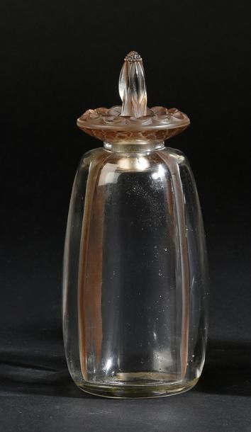 René LALIQUE «Carnette Fleur» - (années 1920)
Rare flacon en verre incolore pressé...