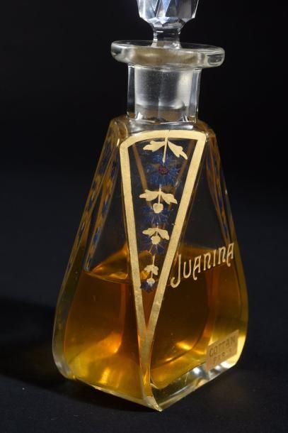 COTTAN «Juanina» (années 1910)
Flacon en cristal incolore pressé moulé de section...