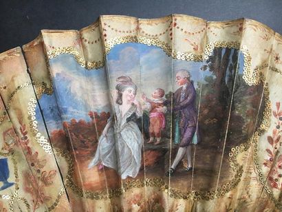 null L'enfant chéri, vers 1780-1785
Eventail plié, feuille en soie peinte d'une scène...