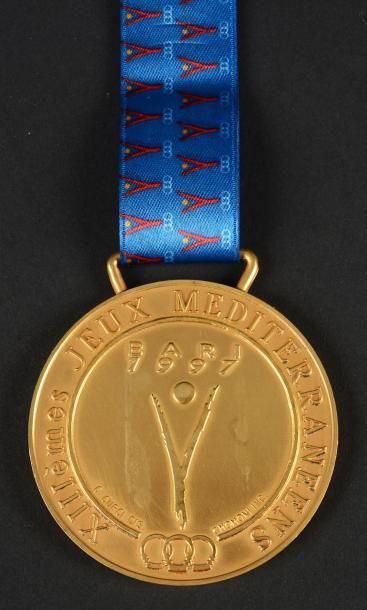 null 1997. Bari
Médaille d'or de vainqueurs des épreuves de gymnastique lors des...