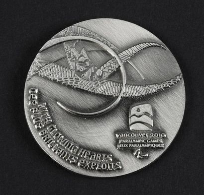 null Médaille officielle de participant des Xème Jeux Paralympiques d'hiver. En métal...