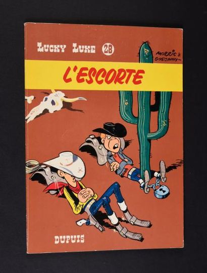 MORRIS LUCKY LUKE 28. L'ESCORTE.
Edition originale Dupuis à l'état tout proche de...