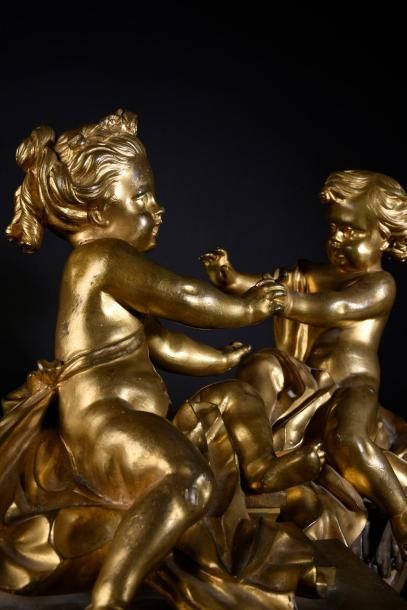 null Paire de chenets en bronze ciselé et doré au modèle dit «des enfants frileux»,...