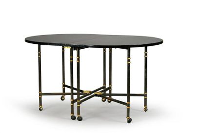 JANSEN 
Table de salle à manger pliante modèle Royal, en bois laqué noir, piètement...