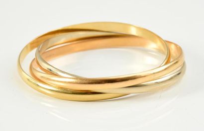 CARTIER 
Bracelet Trinity, trois anneaux en or de trois couleurs. Signé Cartier et...