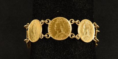 null Bracelet souple en or jaune 750 millièmes, constitué de sept souverains reliés...