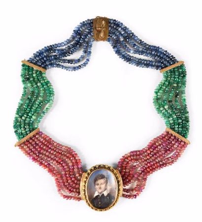 null Collier draperie constitué de multiples rangs de perles facettée de rubis, émeraudes...