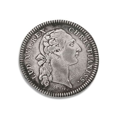 null LOUIS XVI, roi de France (1754-1793).
Jeton en argent signé Jean Duvivier (1687-1761),...