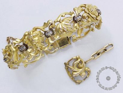 null Beau bracelet articulé en or 750 millièmes, composé de maillons décorés d'un...