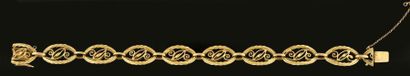 null Bracelet articulé en or 750 millièmes composé de maillons ovales ajourés filigranés....