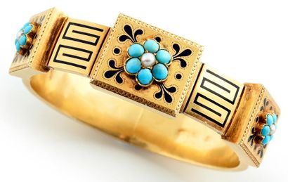 FALIZE Bracelet rigide articulé en or jaune 750 millièmes décoré par trois cartouches...