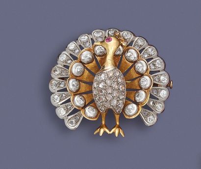 null Broche pendentif stylisant un paon en or 750 et platine 850 millièmes, habillée...