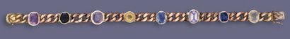 null Bracelet articulé en or rose 750 millièmes, maille gourmette, décoré de 8 motifs...