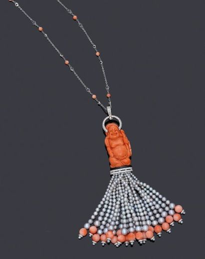 null Spectaculaire sautoir pompon à motif de Bouddha en corail sur un socle en onyx...