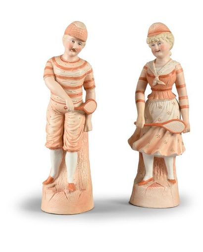 Paire de statuettes en biscuit «Couple au...