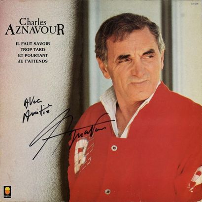 null AZNAVOUR, CHARLES 1 lot de 3 disques vinyles dédicacés par Charles Aznavour....