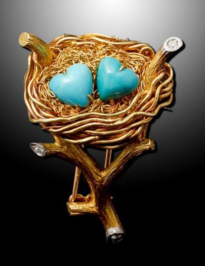 null Une broche en or et platine par MARCHAK, représentant un nid posé entre deux...