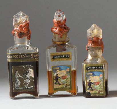 BICHARA MALHAMÉ - (années 1910) 3 rares flacons d'extrait en verre incolore pressé...