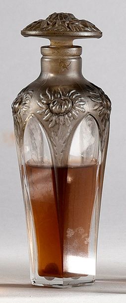 J.Giraud & fils «Dans les Nues» - (années 1910)
Flacon en verre incolore pressé moulé...