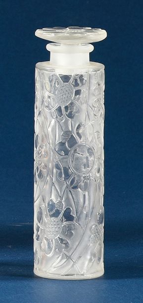 Forvil «5 Fleurs» - (années 1920)
Flacon en verre incolore pressé moulé de section...