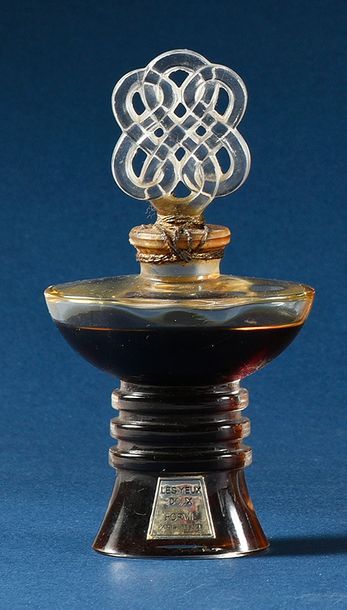 Forvil «Les Yeux Doux» - (années 1930)
Flacon en verre incolore pressé moulé de section...