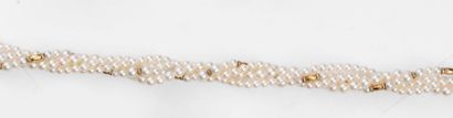 null Collier composé de 4 rangs de perles de culture de 3,2 à 4,5 mm, intercalé de...