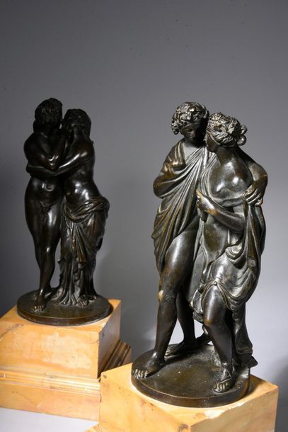 null Pair of bronze subjects with brown patina, depicting couples in the antique...