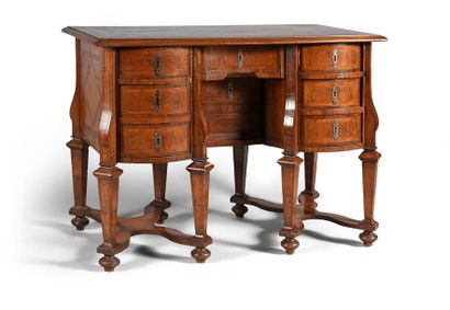 null Mazarin" type desk with veneered wood wall bracket. Eight wafer feet connected...