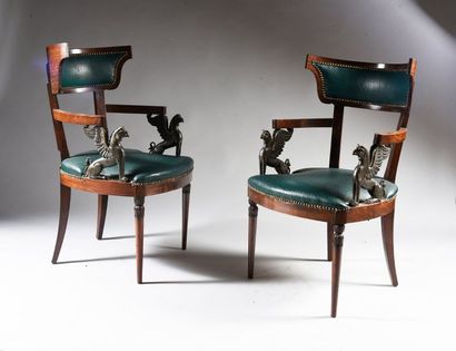 null Pair of mahogany klismos chairs and mahogany veneer, it rests on front baluster...