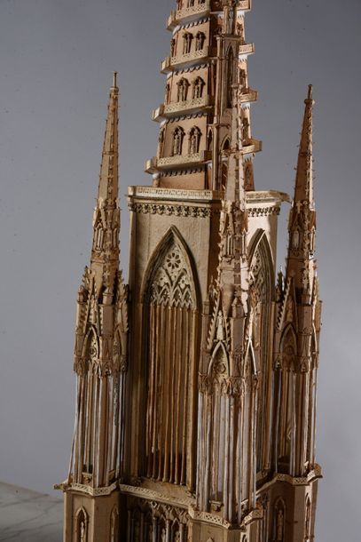 null Two models of a Gothic cathedral bell tower made of cut paper and cardboard,...