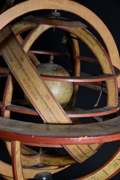 null Armillary sphere in wood covered with engraved and coloured paper, in the style...