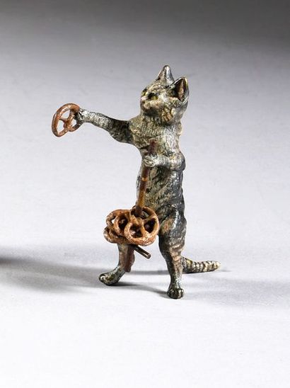 Le chat vendeur de bretzels. H. : 6,5 cm