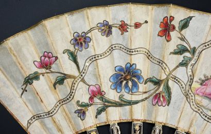 null Rameaux fleuris, vers 1770-1780
Eventail plié, la feuille en soie peinte à la...