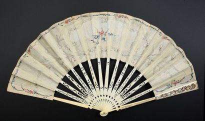 null Music, around 1770-1780
Folded fan, the cream silk leaf embroidered with golden...