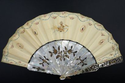 null 18th century spirit, around 1850-1860
Folded fan, the cream skin leaf painted...
