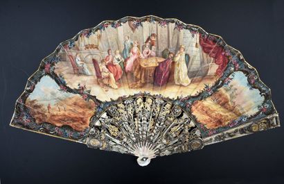 A family evening, around 1900Grand fan folded,...