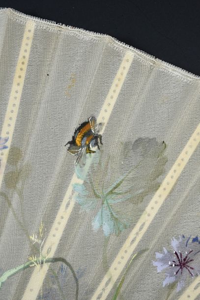 null Daillard, Bleuets and bumblebees, circa 1890-1900Wide fan, the cream fabric...