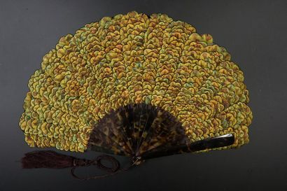 null Peacock feathers, circa 1900
Fan composed of a mosaic of feathers on the back...