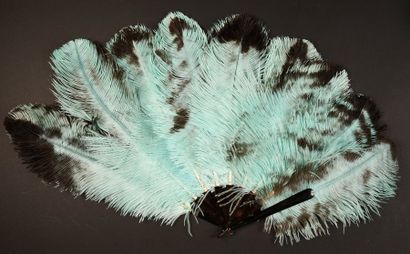 null Two feather fans*After-Eight, circa 1900
Asymmetrical fan made of ostrich feathers...