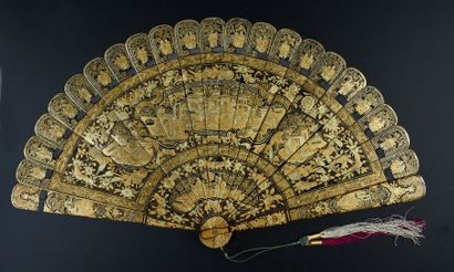 null Meeting in the garden, China, 19th century Black lacquered bamboo fan with gold...