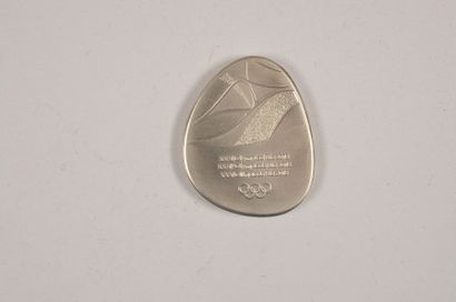 null Médaille officielle de participant. Cupro Nickel. Dim
41x52 mm. Dans sa boîte...