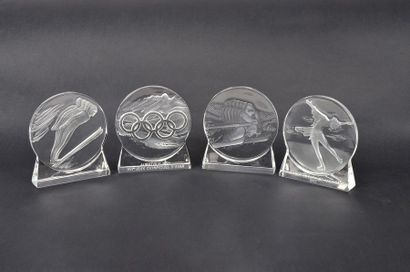 null Set of 3 Lalique crystal statuettes featuring the rings, slalom and springboard....