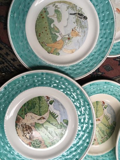 null 
Set of 12 plates and a dish in earthenware representing the fables of La Fontaine....