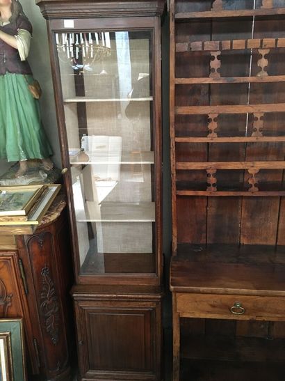 null High display case with one glass door over four shelves and a lower door, oak,...