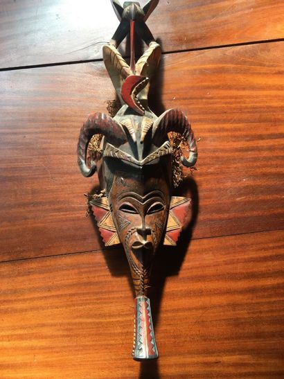 null African handicraft, Ivory Coast mask, end of XXth century, in polychrome wood,...