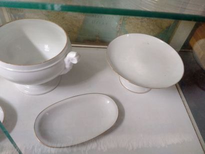 null Limoges, white porcelain service with golden border composed of a dish, a soup...